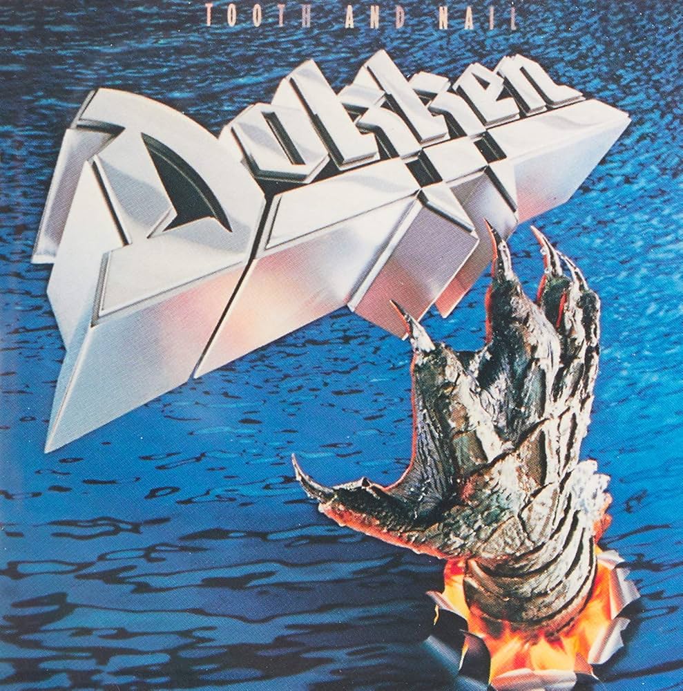 Dokken – Tooth And Nail Vinyle, LP, Album, Bleu [Opaque] Galaxie, Lenticulaire, Édition 40e anniversaire